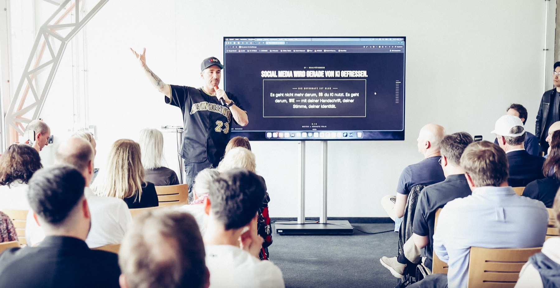 Calvin Hollywood speaking in front of an audience